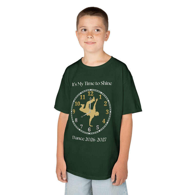 Young boy wearing a youth Gildan 5000B heavy cotton t-shirt in forest green with an It's My Time to Shine Breakdance 2026-2027 theme
