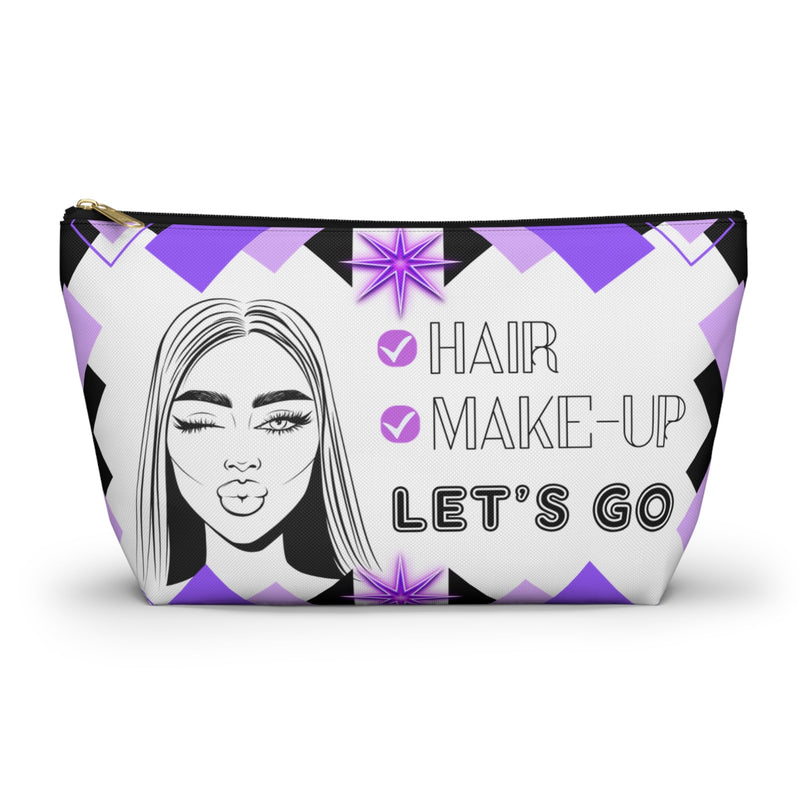 Front view of a white make-up bag with a Hair Make-Up Let's Go text and geometrical pattern
