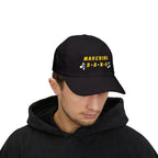 Man wearing a black cap with MARCHING BAND text and musical notes.