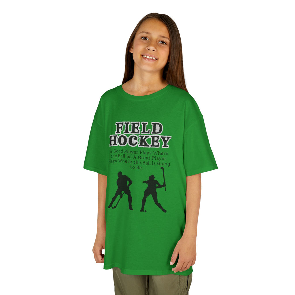 Young girl wearing a youth Gildan 5000B heavy cotton t-shirt in irish green with a Field Hockey text and graphic