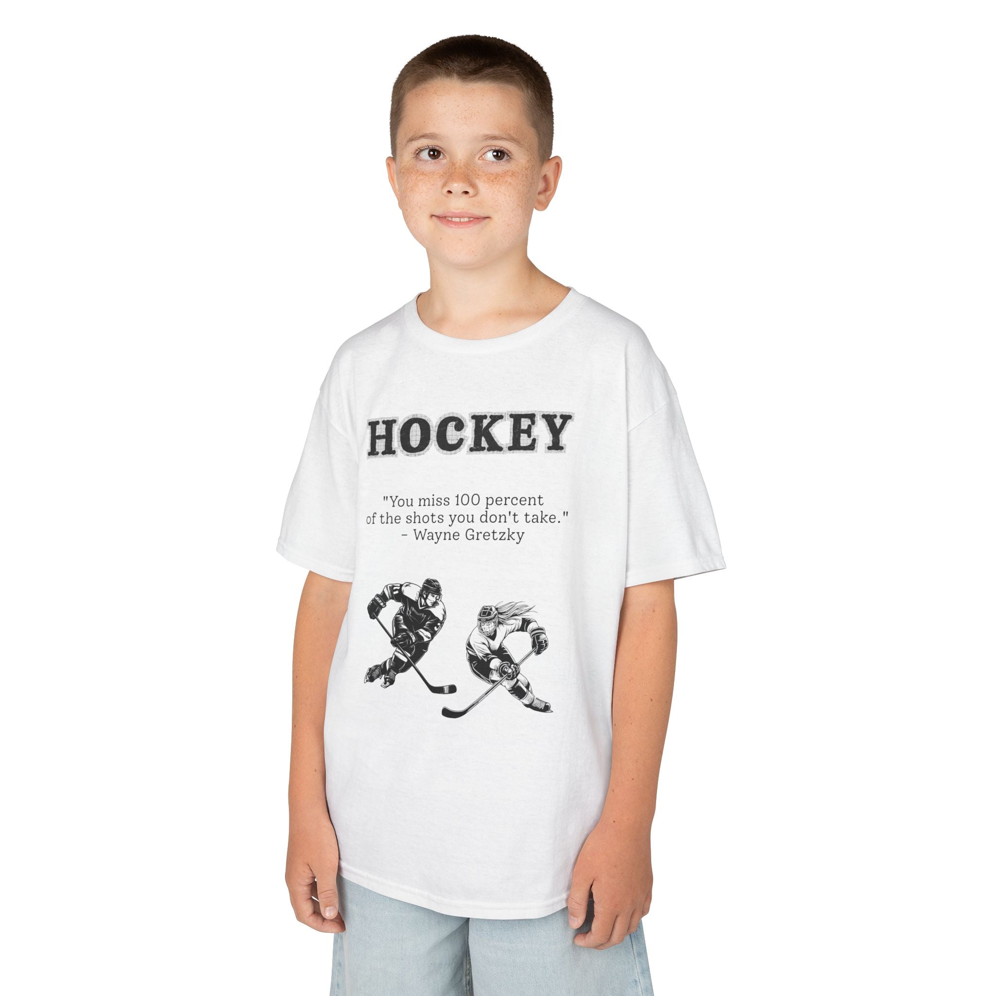 Young boy wearing a youth Gildan 5000B heavy cotton t-shirt in white with a Hockey text and graphic