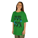 Young girl wearing a youth Gildan 5000B heavy cotton t-shirt in irish green with a Hip Hop text and dancers