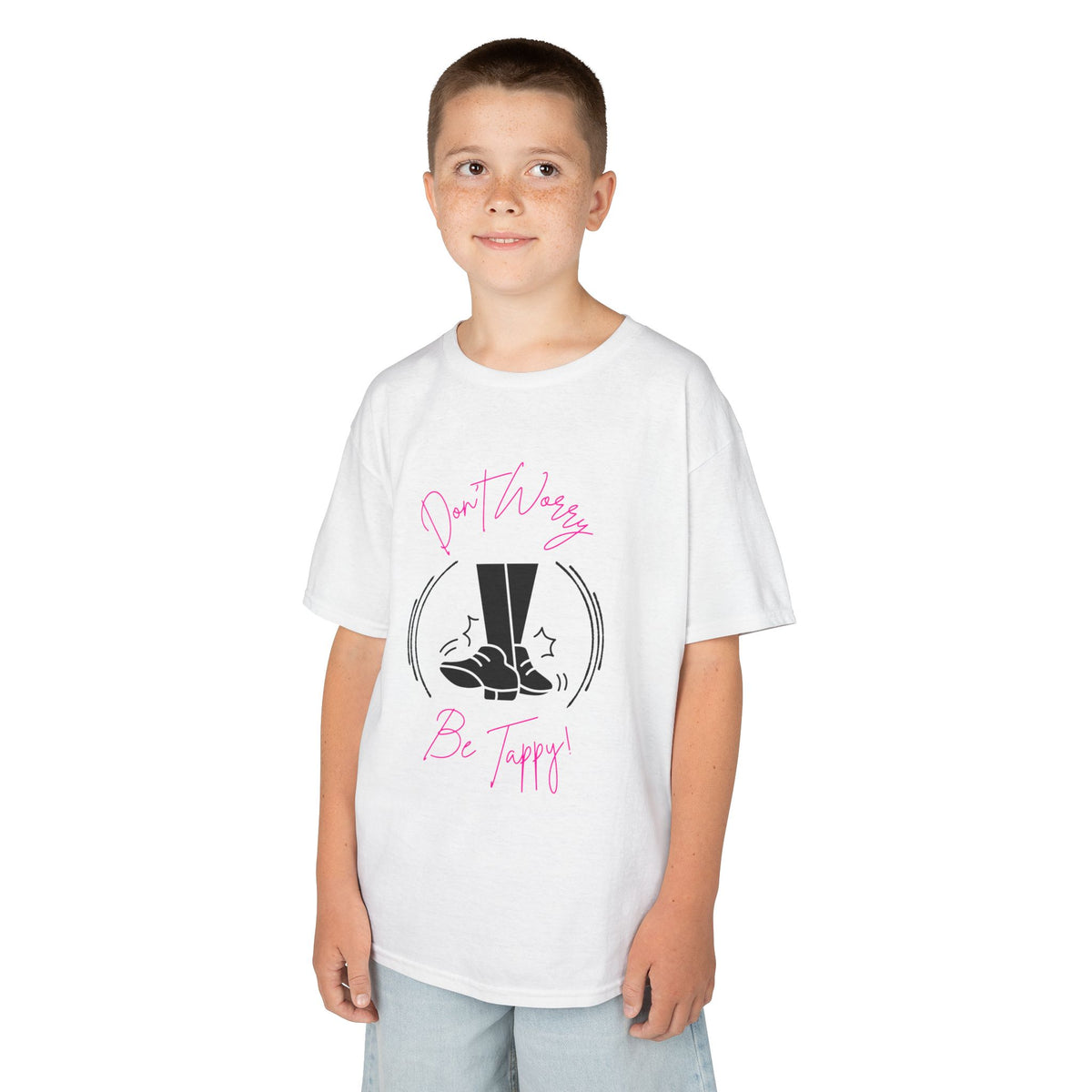 Young boy wearing a youth Gildan 5000B heavy cotton t-shirt in white with a Don't Worry Be Tappy Tap Shoe design