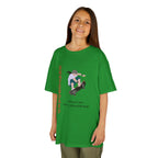 Young girl wearing a youth Gildan 5000B heavy cotton t-shirt in irish green featuring a girl Skateboarding