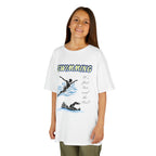 Young girl wearing a youth Gildan 5000B heavy cotton t-shirt in white with a Swimming text and graphic