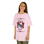 Young girl wearing a youth Gildan 5000B heavy cotton t-shirt in light pink with a Drama Club text and graphic 