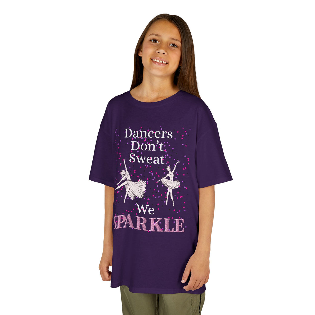 Young girl wearing a youth Gildan 5000B heavy cotton t-shirt in purple with a Dancer's Don't Sweat We Sparkle text and graphic