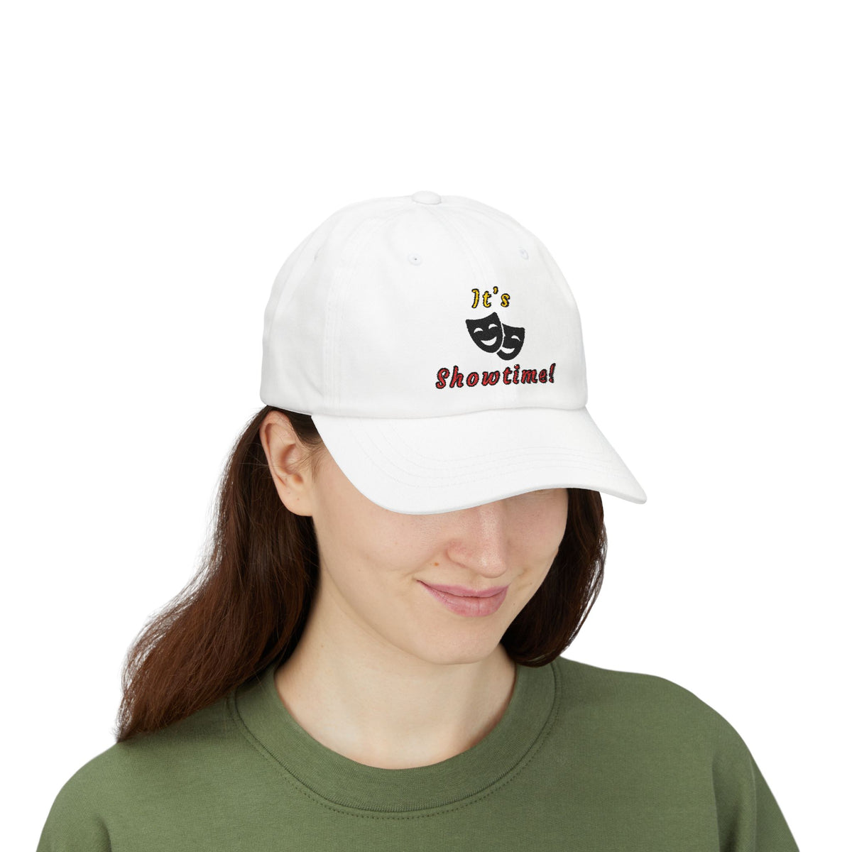 Woman wearing a white embroidered classic dad cap hat with an It's Showtime text and graphic 