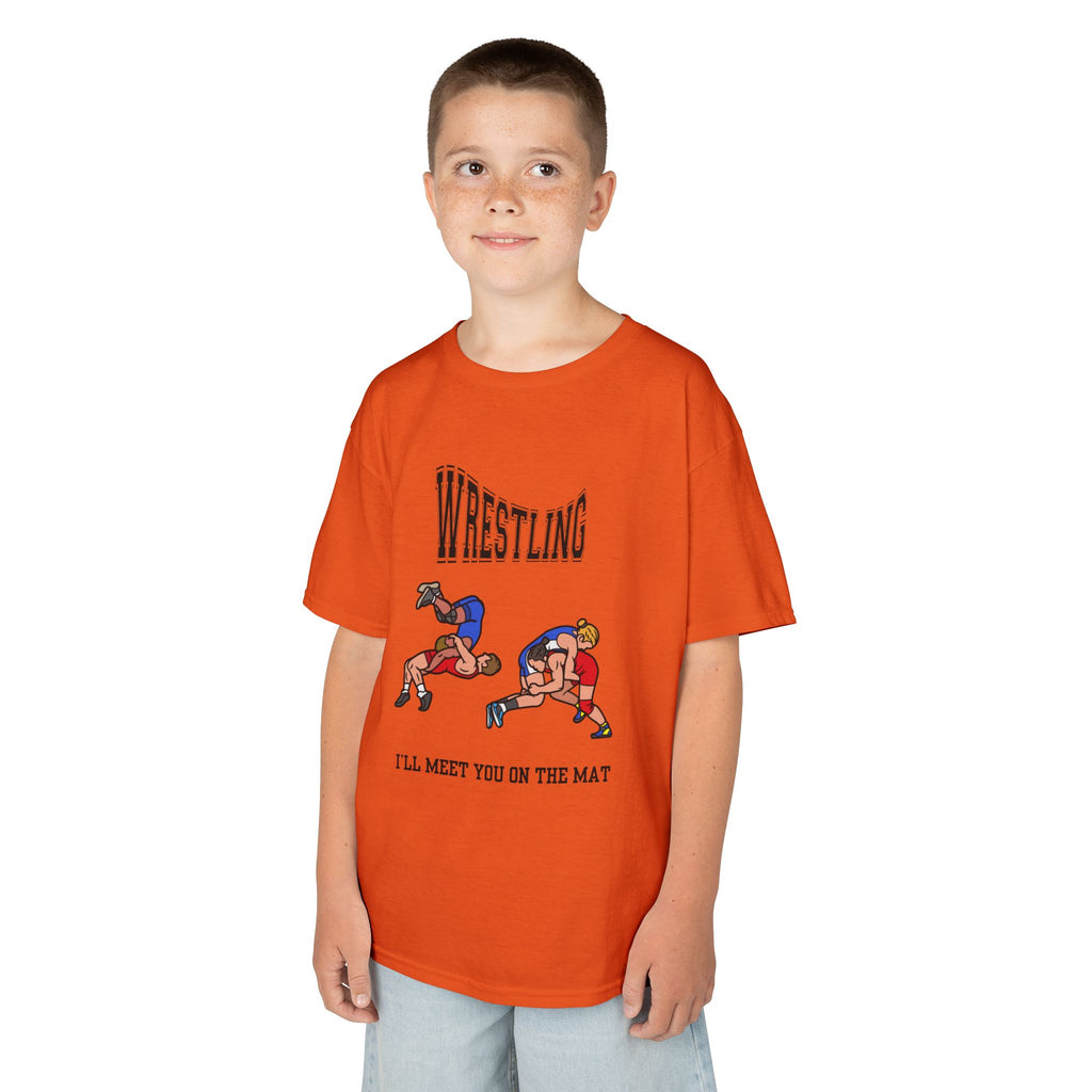 Young boy wearing a youth Gildan 5000B heavy cotton t-shirt in orange with a Wrestling text and graphic