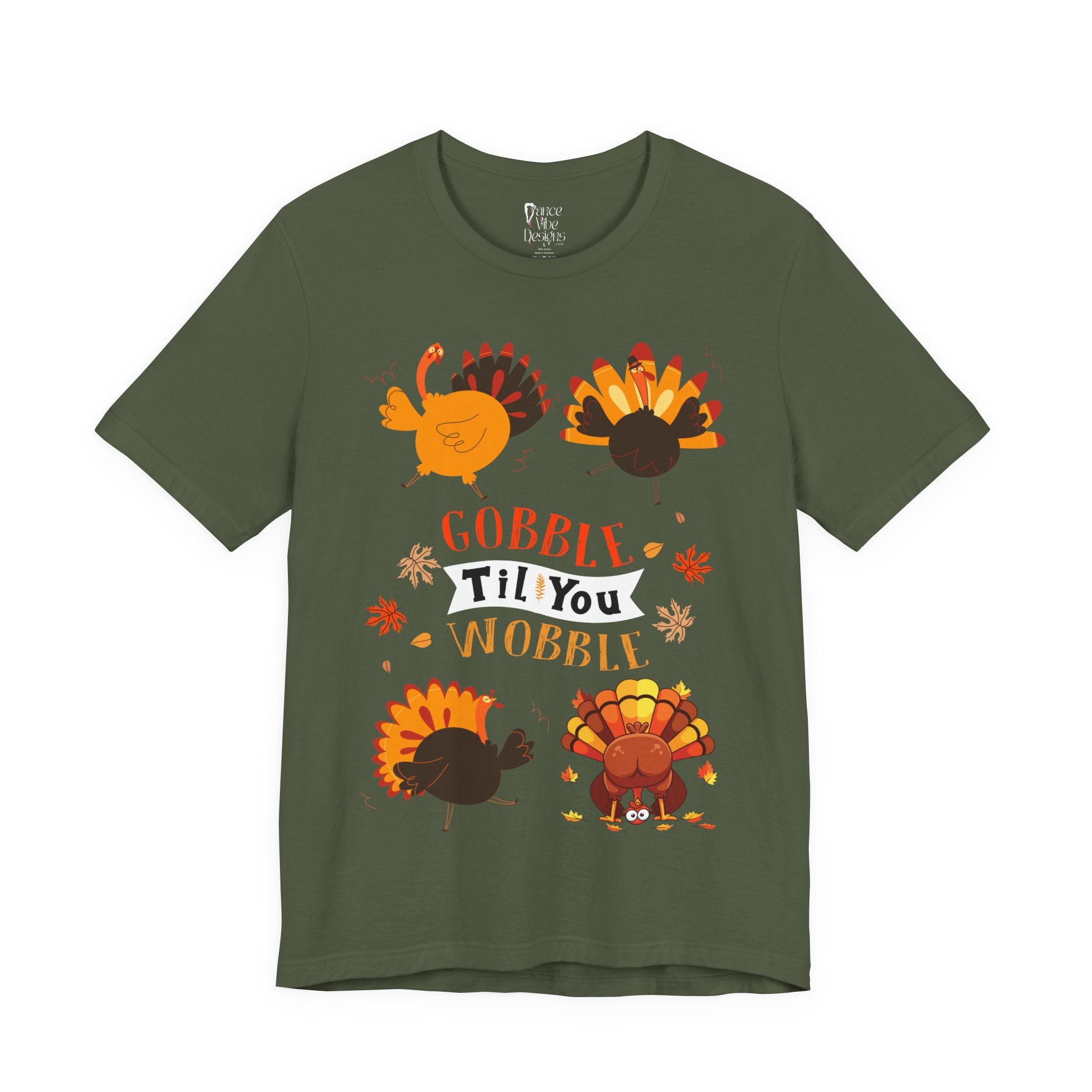 A military green short-sleeve t-shirt with a colorful Thanksgiving graphic featuring cartoon turkeys and the text GOBBLE TIL YOU WOBBLE.