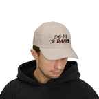 Man wearing a stone embroidered classic dad cap hat with a 5 6 7 8 Dance text and graphic