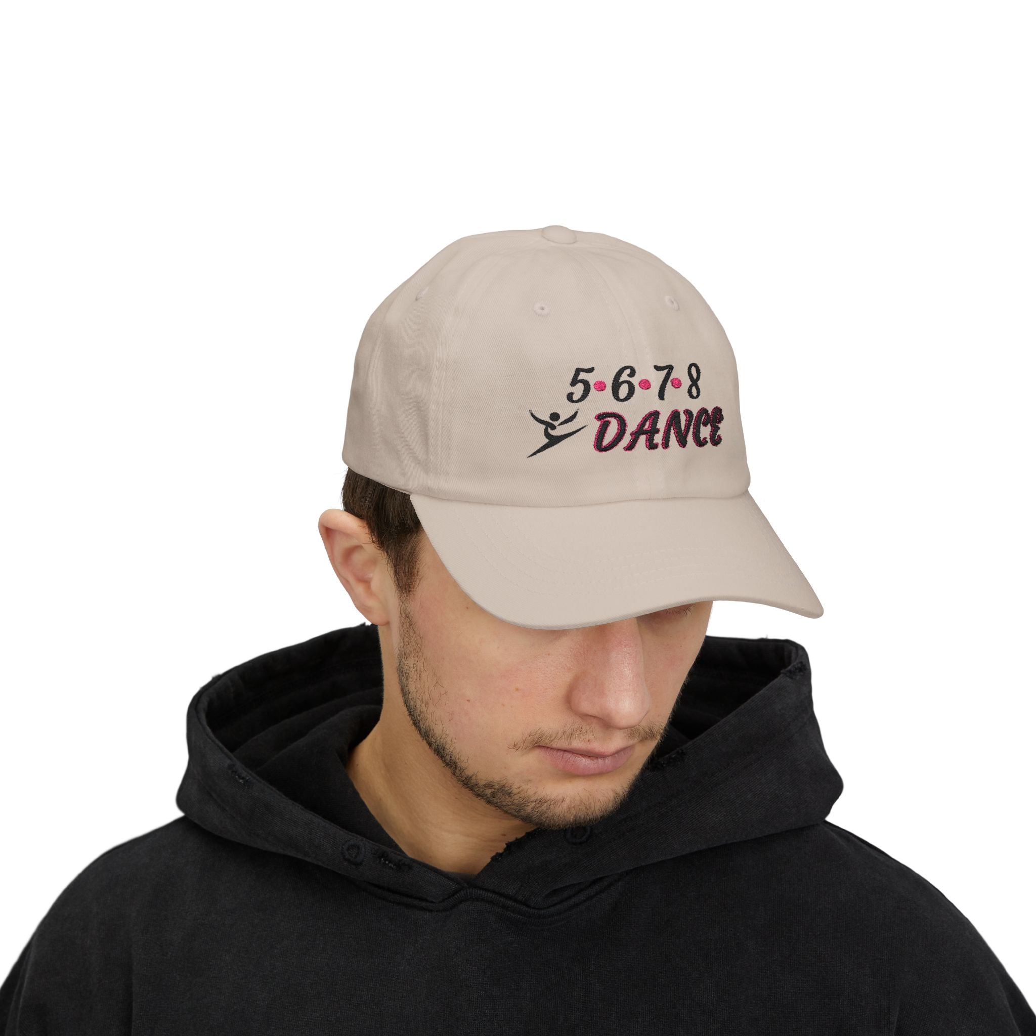 Man wearing a stone embroidered classic dad cap hat with a 5 6 7 8 Dance text and graphic