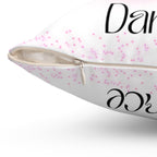 Throw Pillow with dance-themed design featuring ballerinas and the word Dance in rainbow colors with hearts showing a close up of the zipper