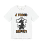 Front view of a white graphic T-shirt with a black chess knight design and the words A PROUD KNIGHT on the front.