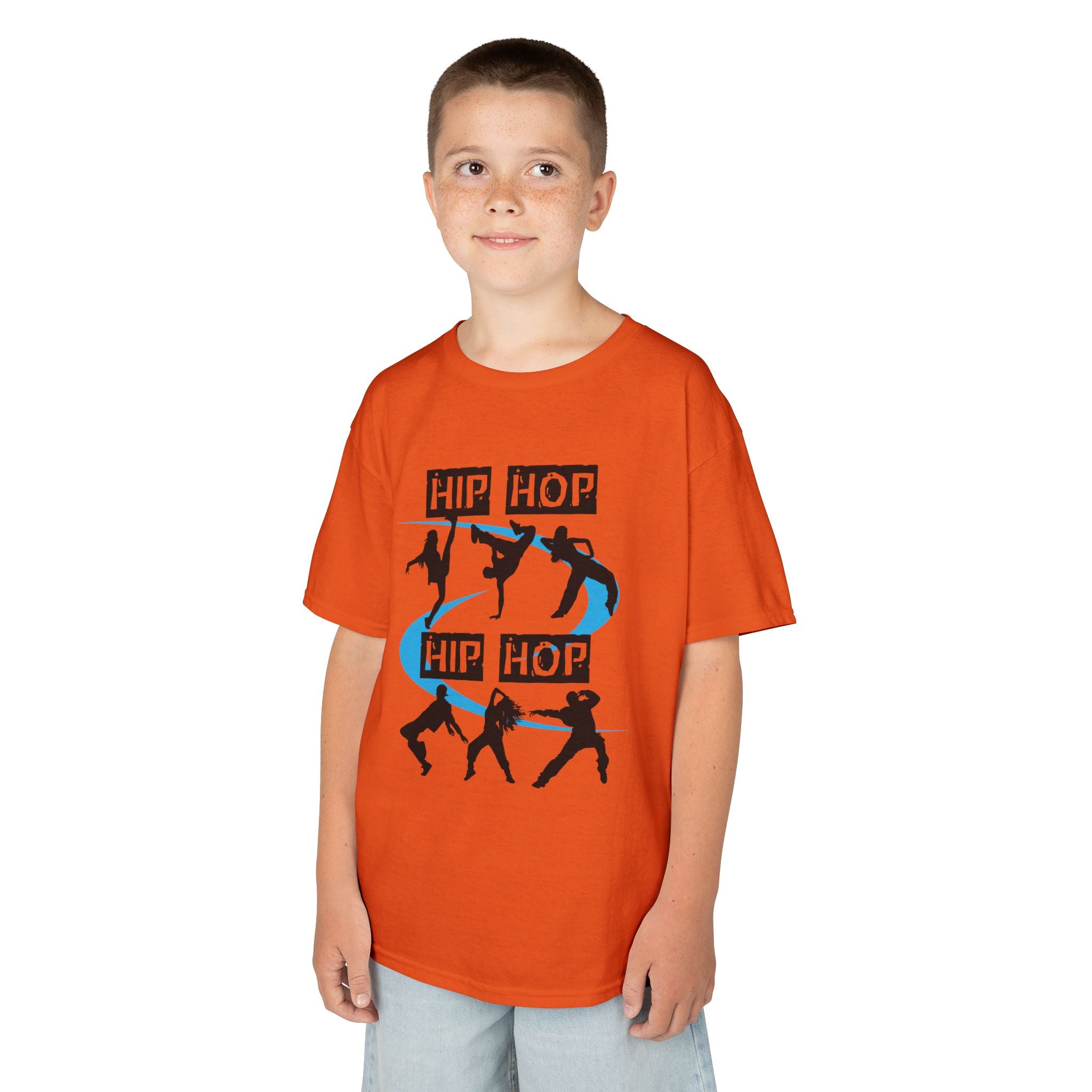 Young boy wearing a youth Gildan 5000B heavy cotton t-shirt in orange with a Hip Hop text and dancers