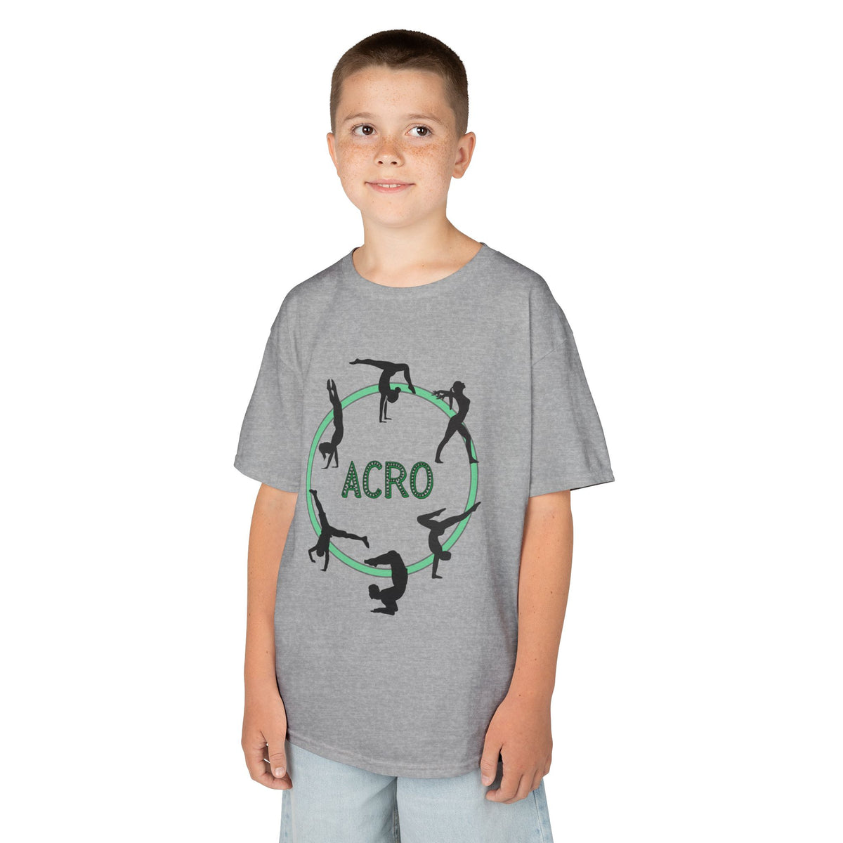 Young boy wearing a youth Gildan 5000B heavy cotton t-shirt in sport grey with an Acro Gymnastics theme