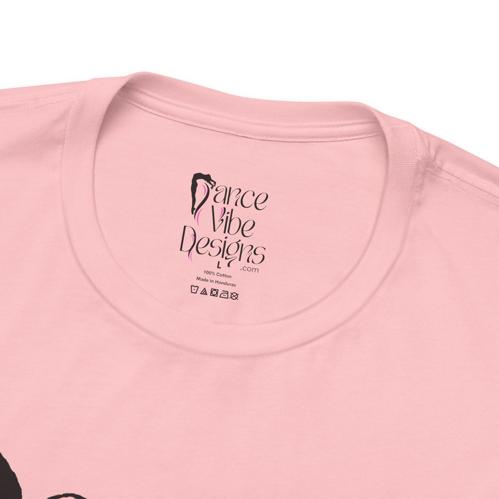 Close-up of a crewneck t-shirt showing the inner neck label with the Dance Vibe Designs logo above the care instructions.