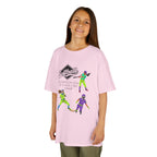 Young girl wearing a youth Gildan 5000B heavy cotton t-shirt in light pink with a Softball text and graphic