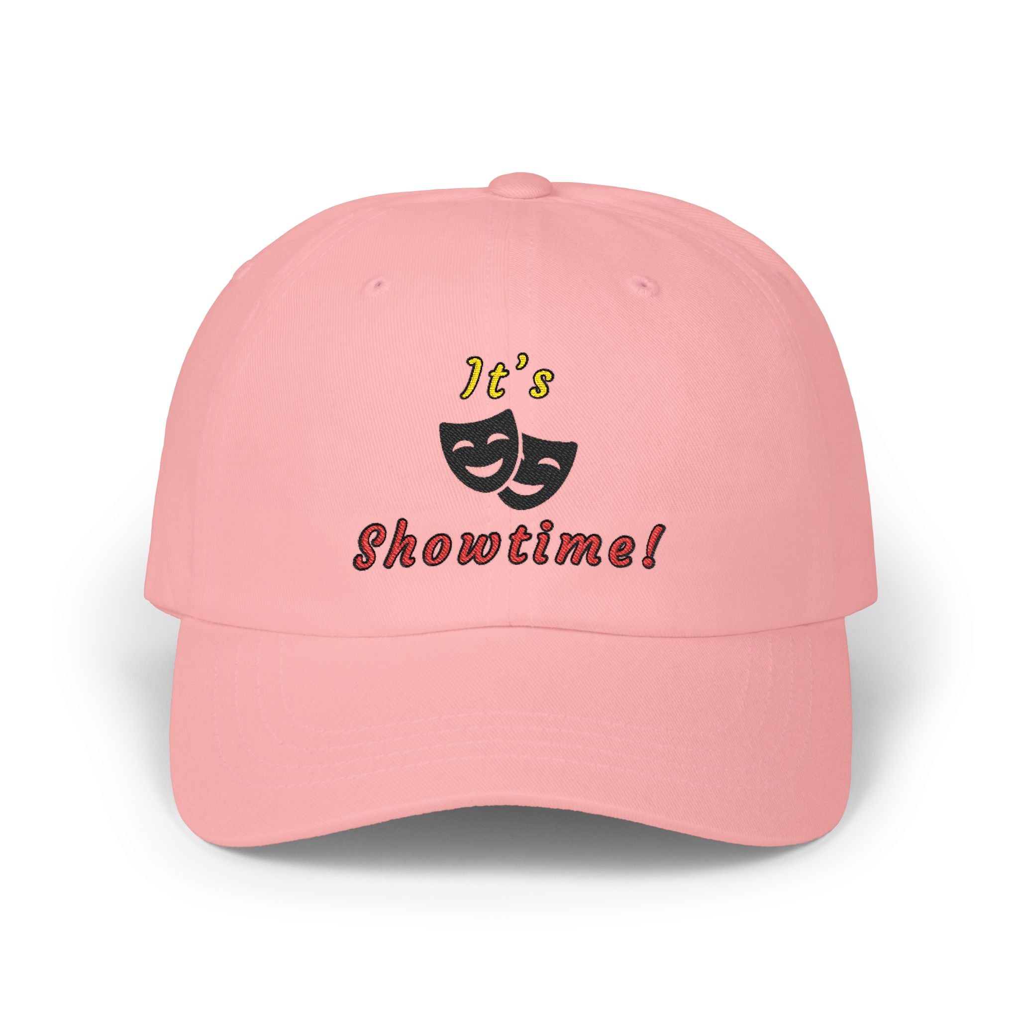 Pink embroidered classic dad cap hat with an It's Showtime text and graphic Front view