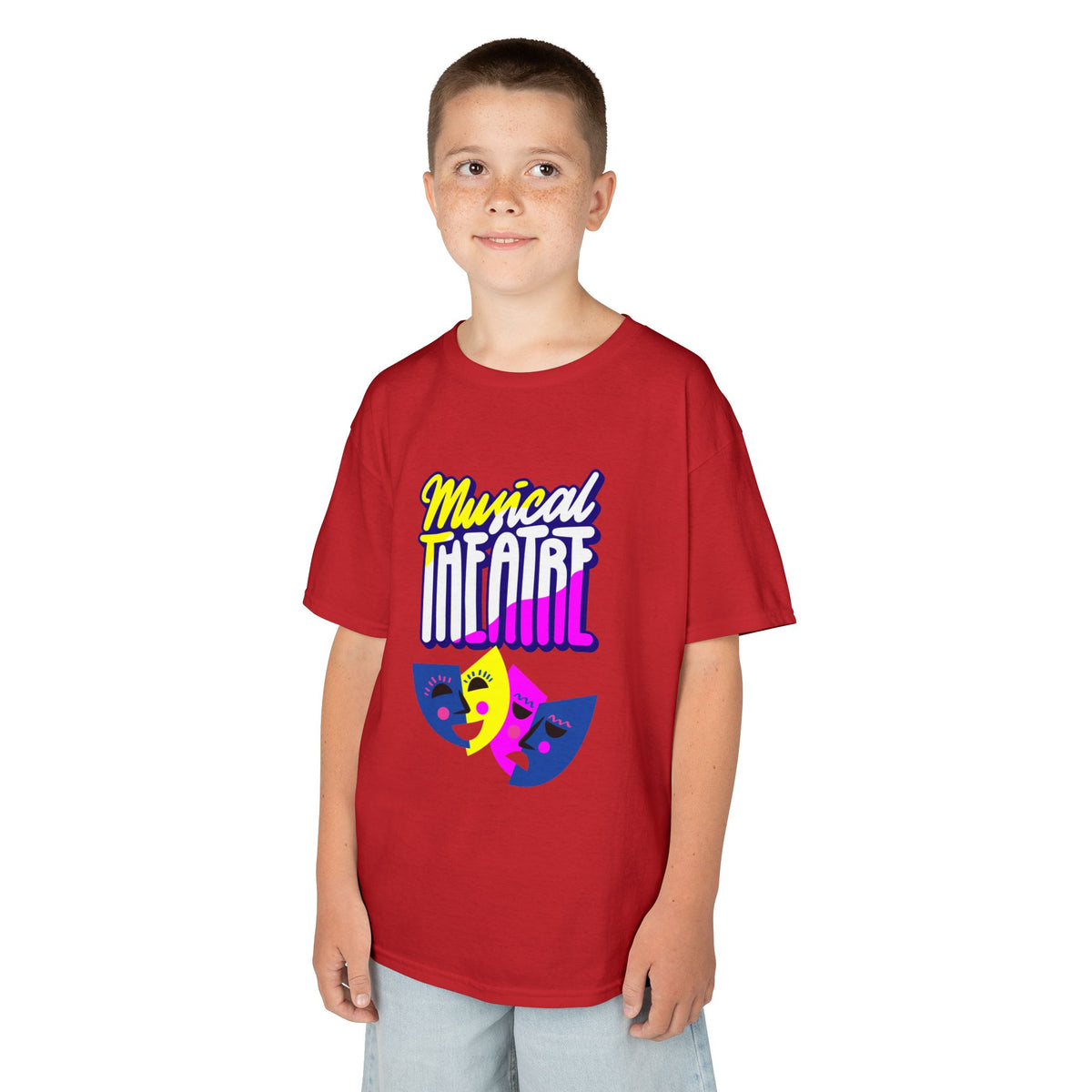 Young boy wearing a youth Gildan 5000B heavy cotton t-shirt in red with a Musical Theater rainbow mask graphic