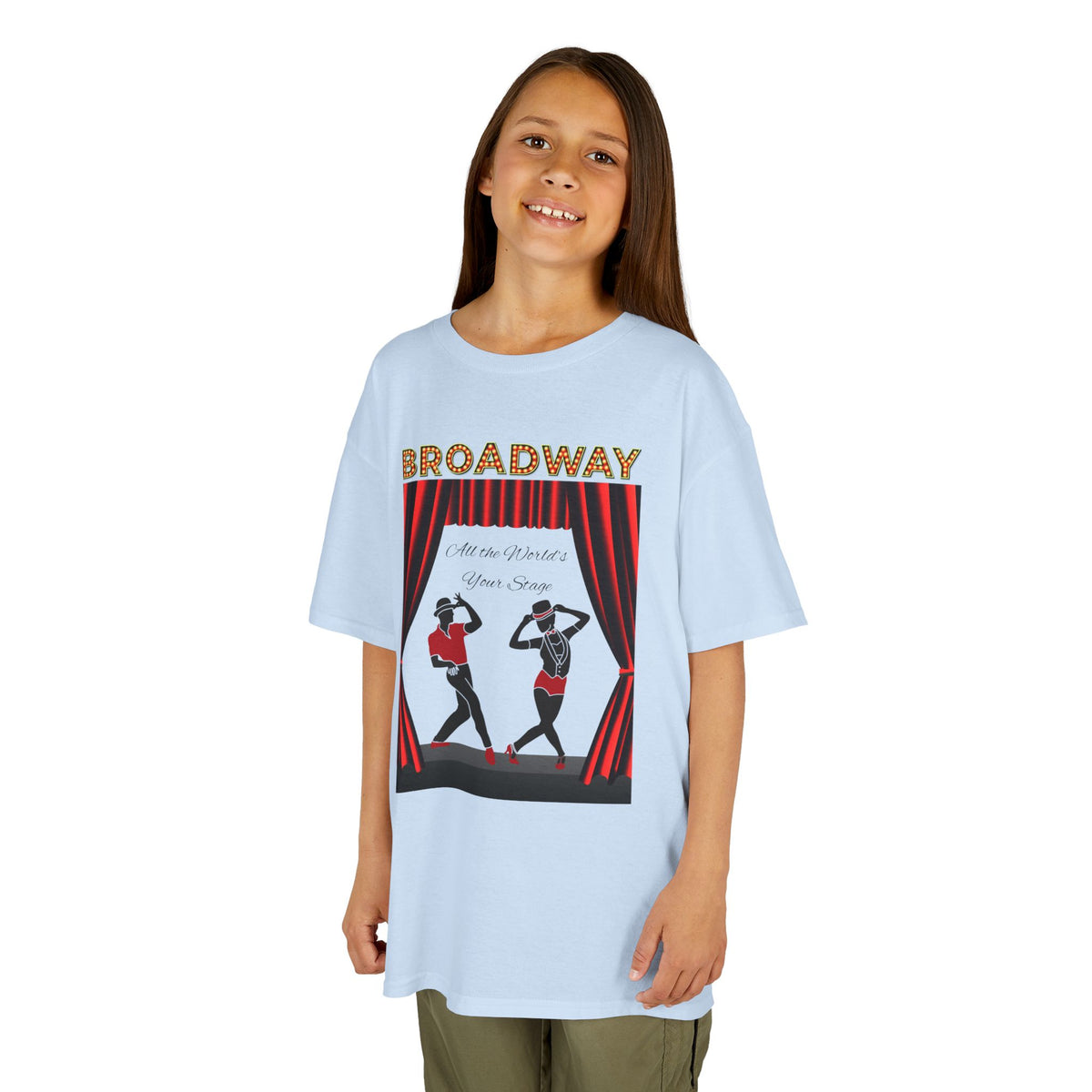 Young girl wearing a youth Gildan 5000B heavy cotton t-shirt in light blue with a Broadway text and graphic