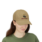 Woman wearing a khaki embroidered classic dad cap hat with an It's Showtime text and graphic 