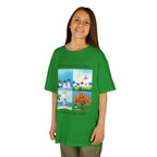Young girl wearing a youth Gildan 5000B heavy cotton t-shirt in irish green with an A New Season to Shine Dance 2026-2027 theme