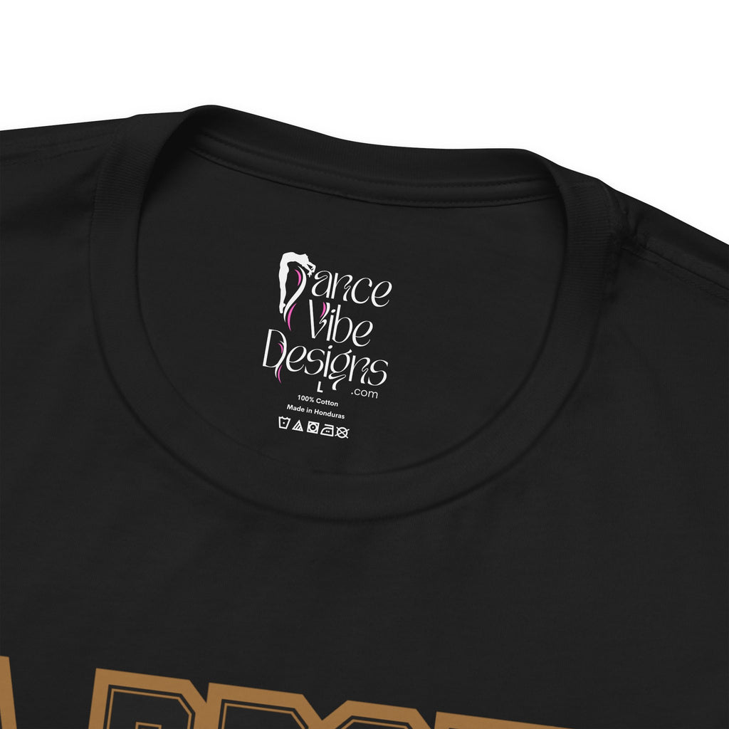 Close-up of a black crewneck t-shirt's inner neck label printed with the brand Dance Vibe Designs logo above the care instructions.