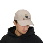 Man wearing a stone embroidered classic dad cap hat with an It's Showtime text and graphic 