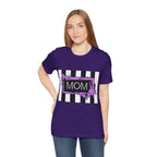 Woman wearing a Beetlejuice inspired Halloween MOM shirt in purple.