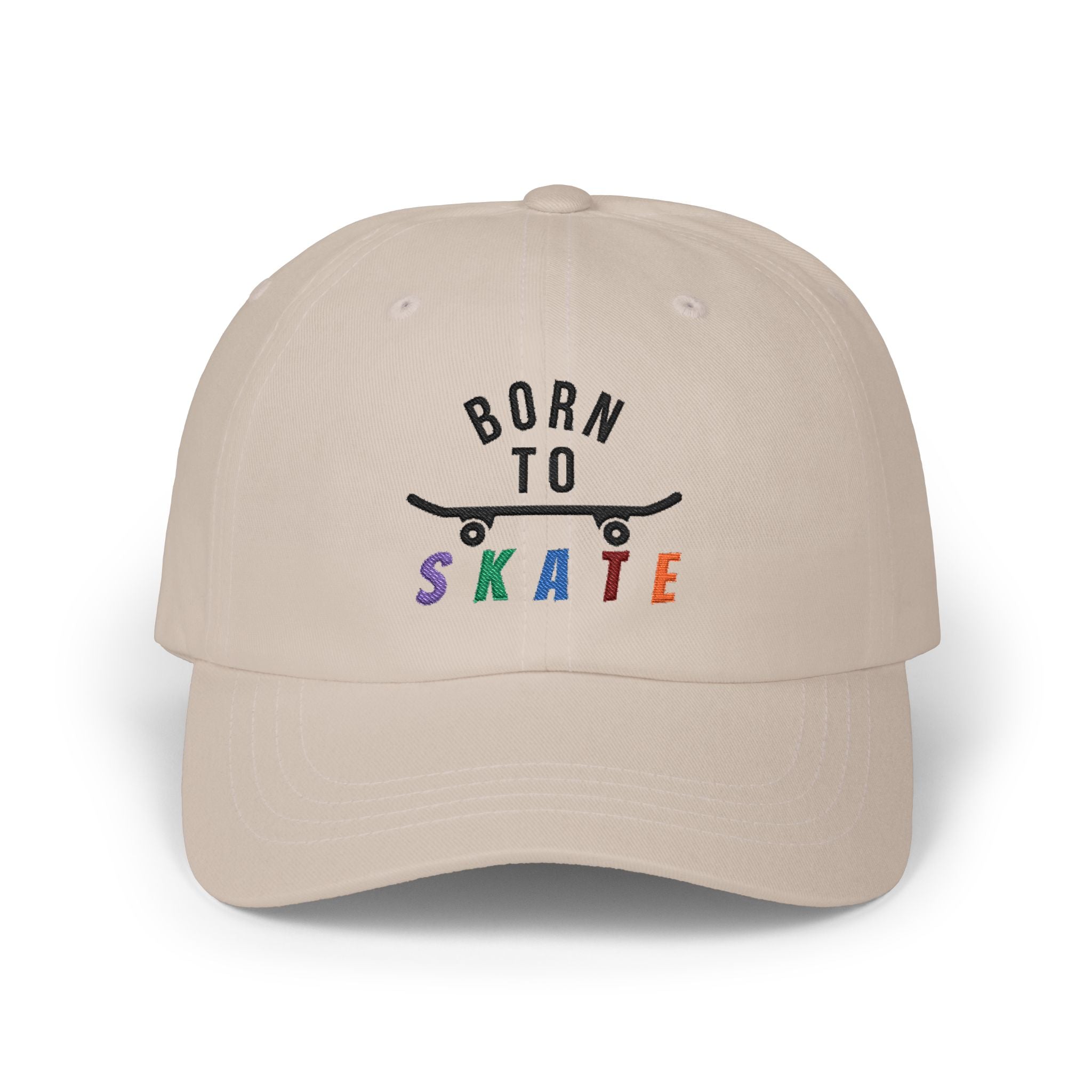 A stone baseball cap featuring a graphic on the front that reads BORN TO SKATE with a black skateboard silhouette and colorful lettering for SKATE.