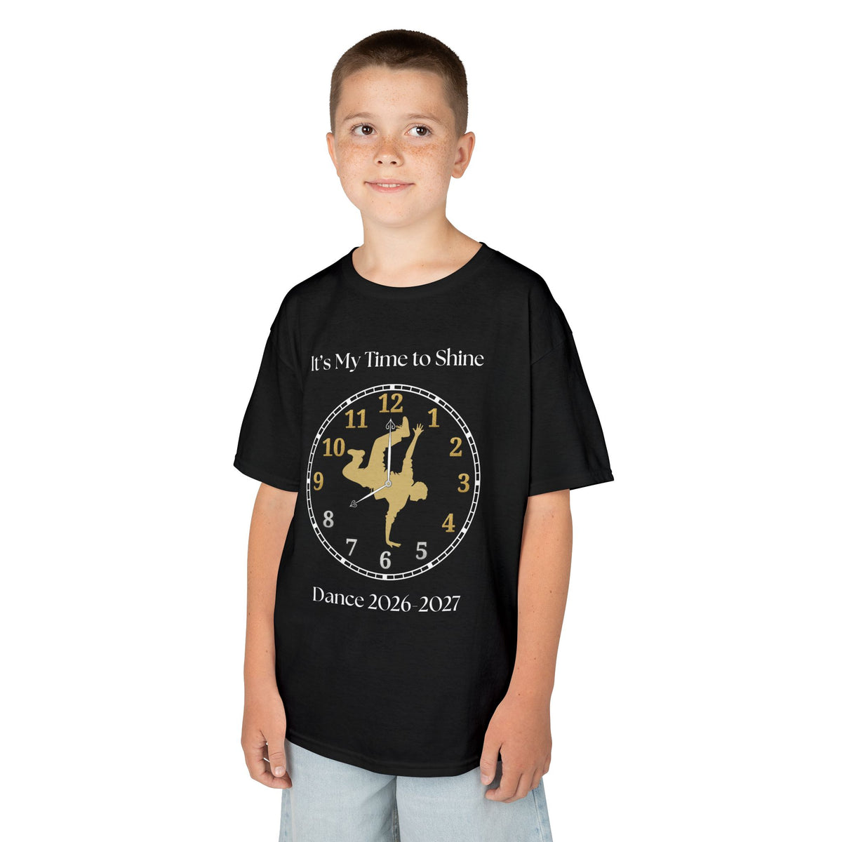 Young boy wearing a youth Gildan 5000B heavy cotton t-shirt in black with an It's My Time to Shine Breakdance 2026-2027 theme