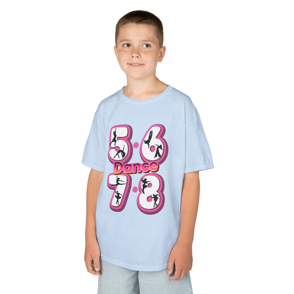 Young boy wearing a Gildan 5000B heavy cotton t-shirt in light blue with a 5678 Dance text and graphic