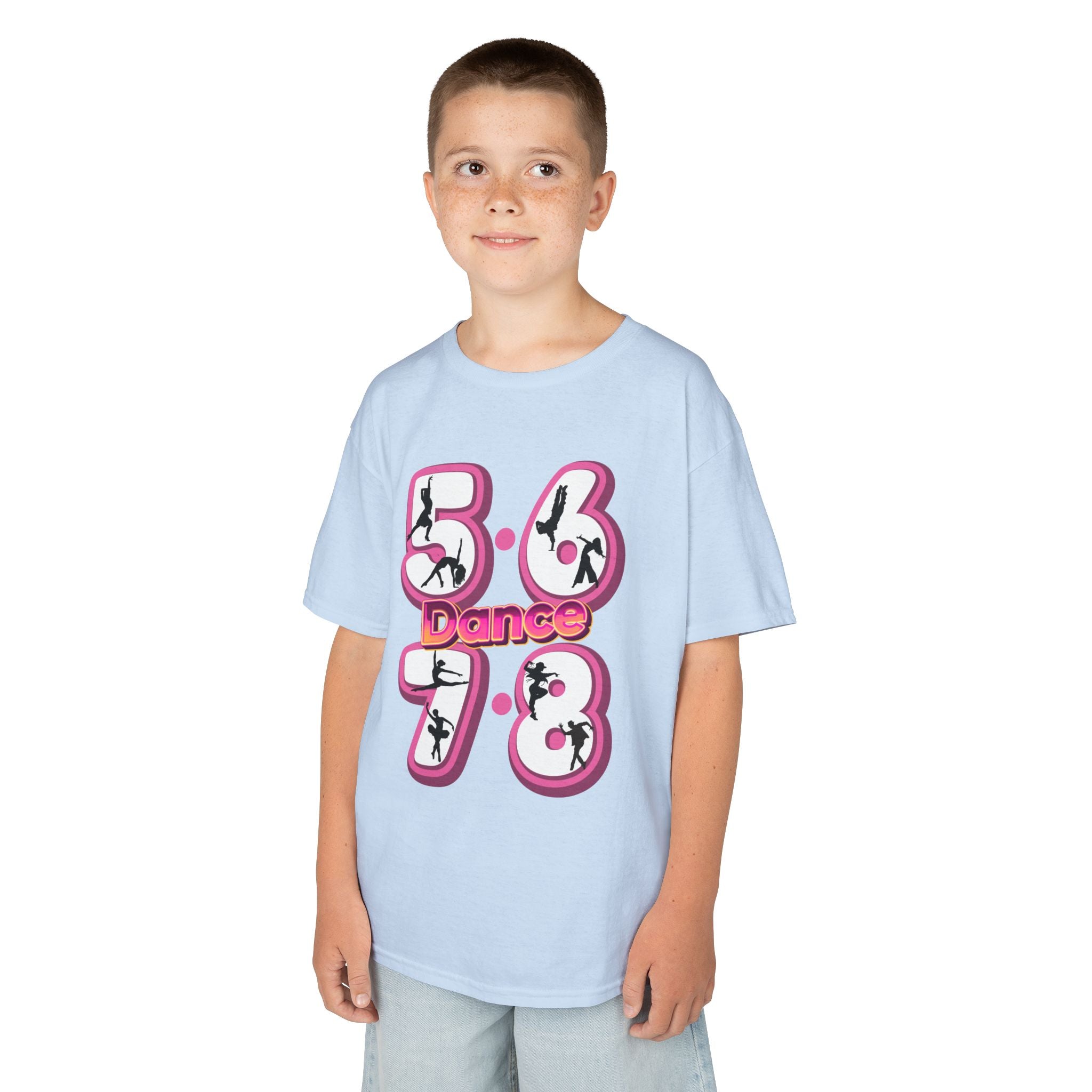 Young boy wearing a Gildan 5000B heavy cotton t-shirt in light blue with a 5678 Dance text and graphic