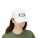Woman wearing a white embroidered classic dad cap hat with a Hip Hop text and graphic