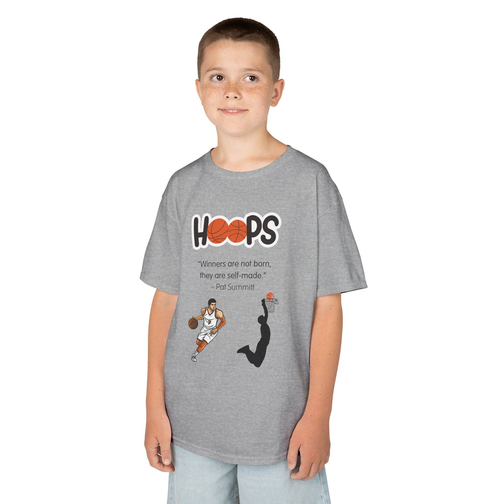 Young boy wearing a youth Gildan 5000B heavy cotton t-shirt in sport grey with a Boys Basketball theme