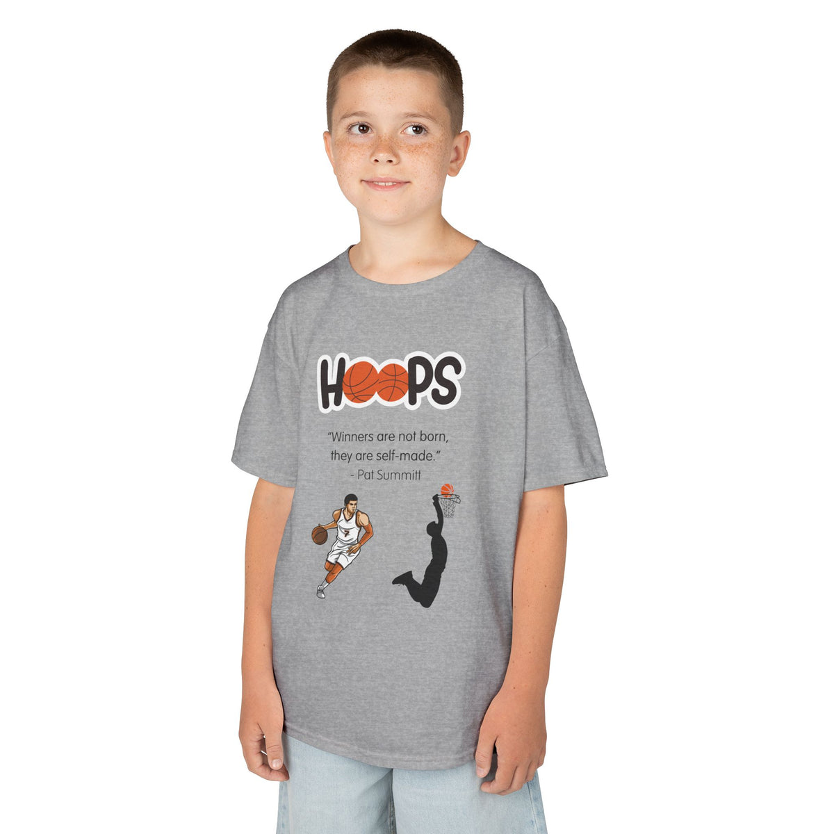 Young boy wearing a youth Gildan 5000B heavy cotton t-shirt in sport grey with a Boys Basketball theme