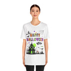 A woman wearing a white t-shirt with a colorful Happy Halloween text and haunted house design.