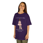 Young girl wearing a youth Gildan 5000B heavy cotton t-shirt in purple with a First Dance Class theme
