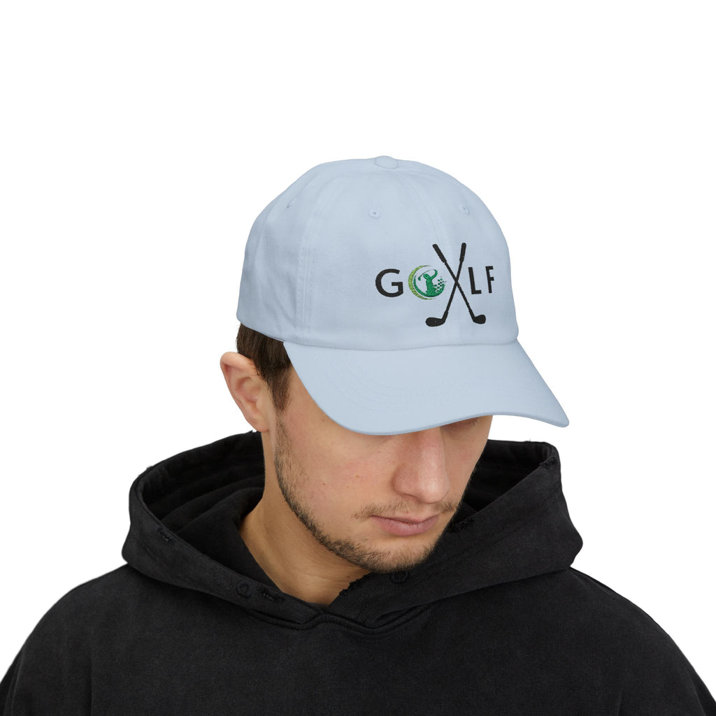 Man wearing a light blue embroidered classic dad cap hat with a Golf text and graphic