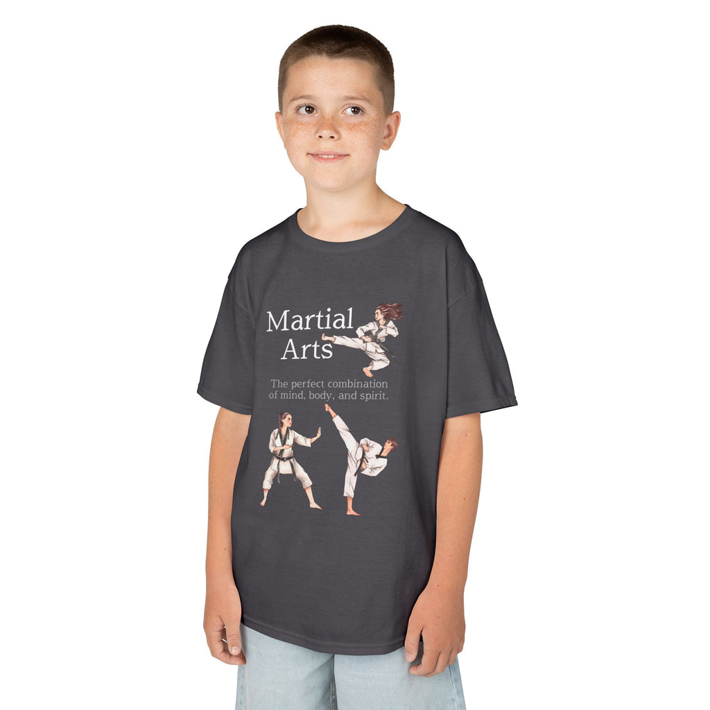 Young boy wearing a youth Gildan 5000B heavy cotton t-shirt in charcoal with a Martial Arts text and graphic