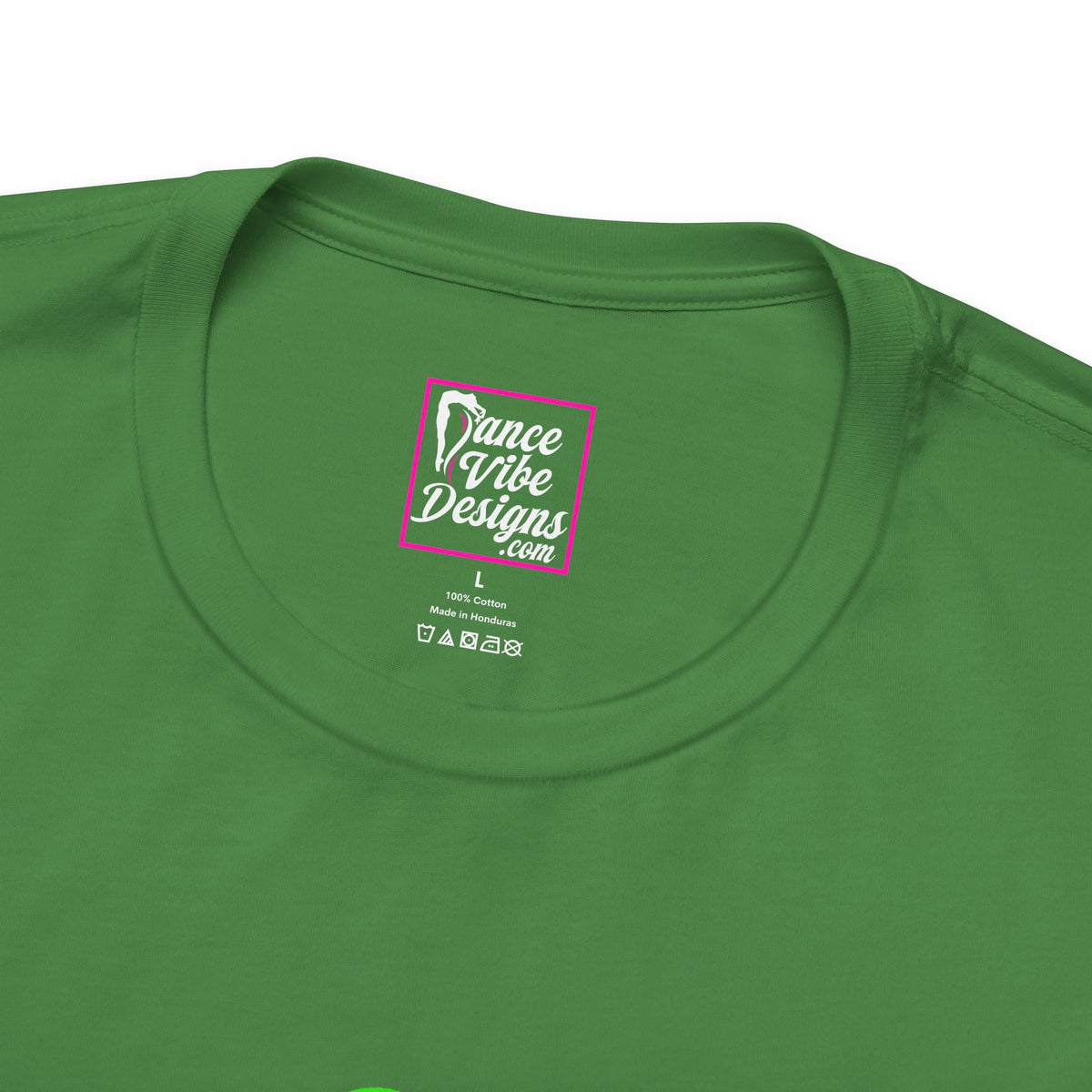 Close up of a Dance Vibe Designs custom neck label above the t-shirt care instructions.
