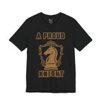 Front view of a black graphic T-shirt with a gold chess knight design and the words A PROUD KNIGHT on the front.
