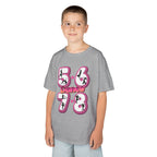 Young boy wearing a Gildan 5000B heavy cotton t-shirt in sport grey with a 5678 Dance text and graphic