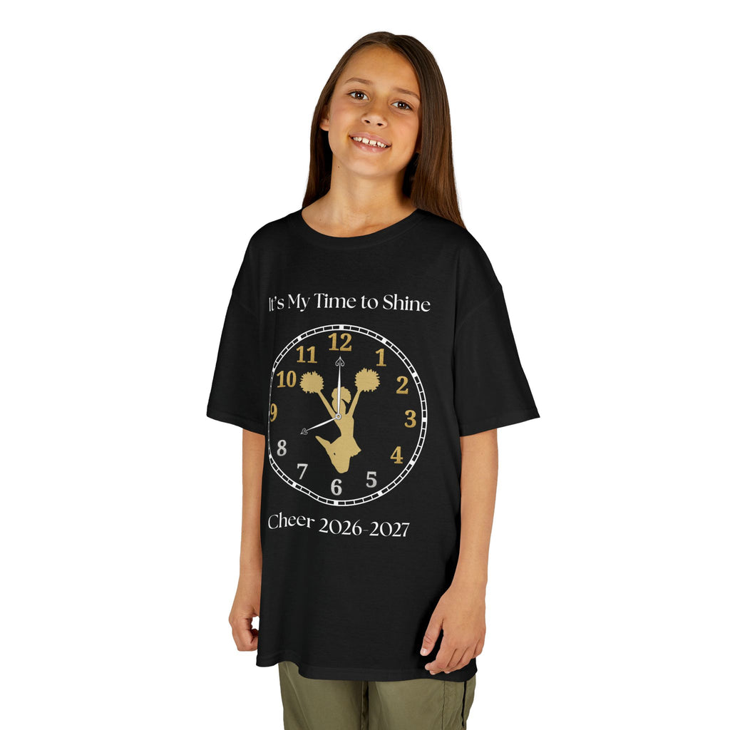 Young girl wearing a youth Gildan 5000B heavy cotton t-shirt in black with an It's My Time to Shine Cheer 2026-2027 theme