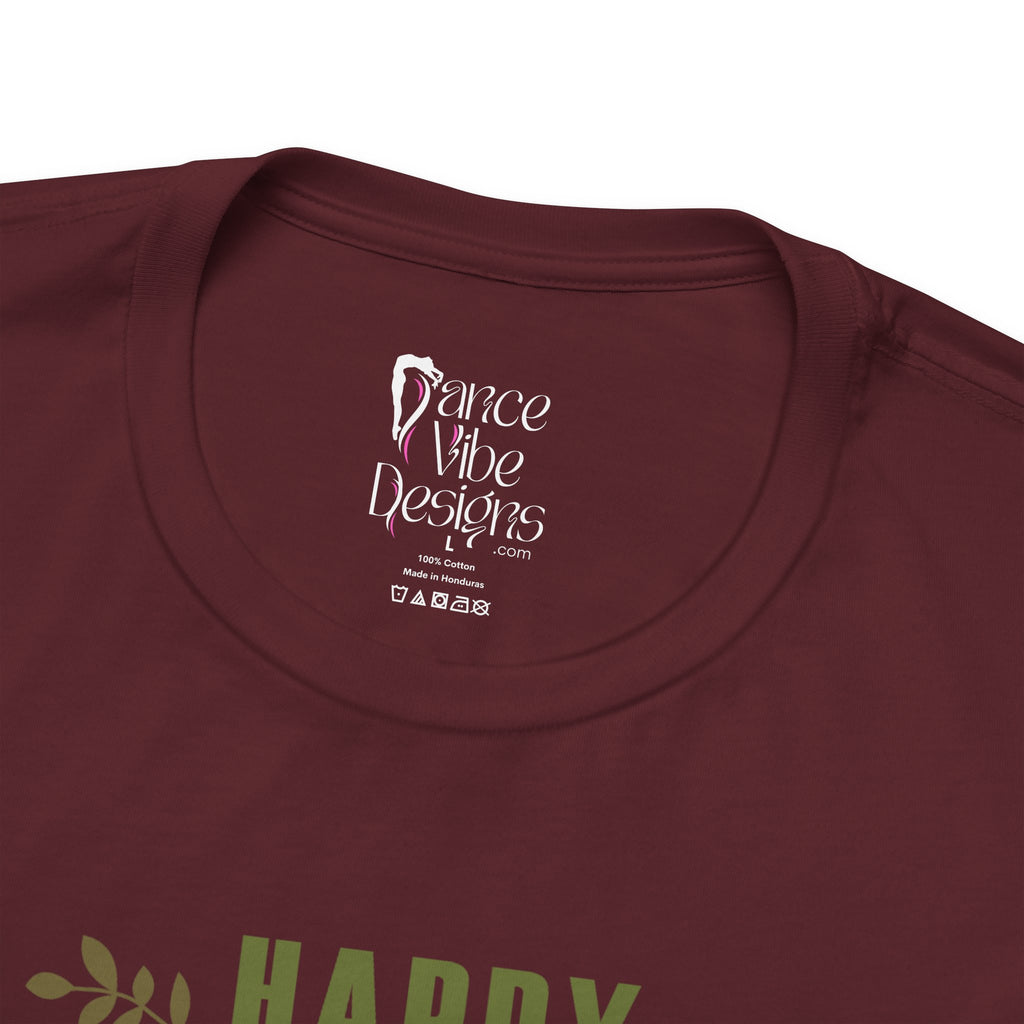 Close-up of a maroon crewneck t-shirt showing the inner neck label with Dance Vibe Designs LLC printed in white.