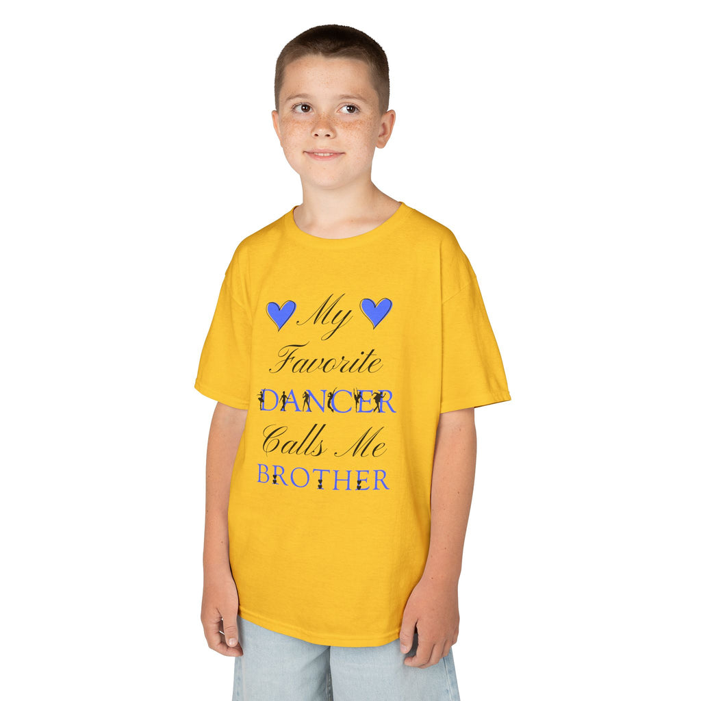 A young boy wearing a daisy t-shirt with a graphic that reads My Favorite Dancer Calls Me Brother.