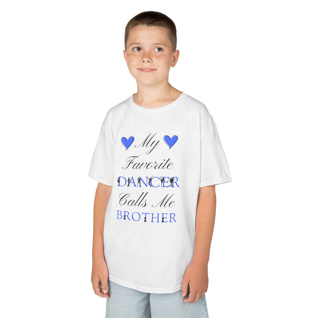 A young boy wearing a white t-shirt with a graphic that reads My Favorite Dancer Calls Me Brother.