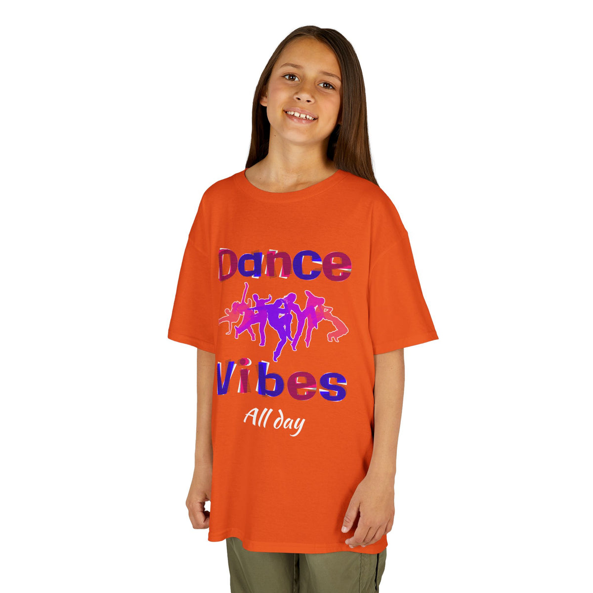 Young girl wearing a youth Gildan 5000B heavy cotton t-shirt in orange with a Dance Vibes All Day text and graphic