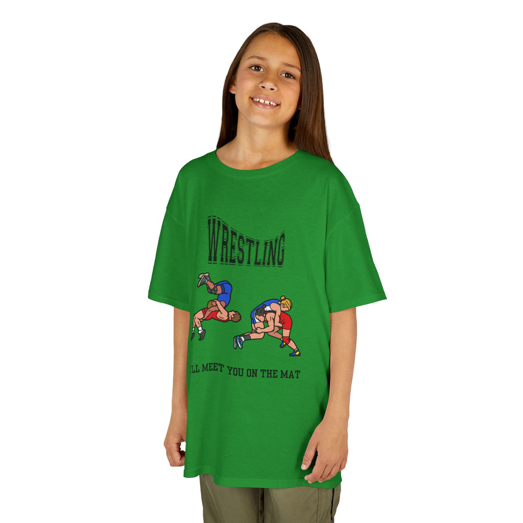 Young girl wearing a youth Gildan 5000B heavy cotton t-shirt in irish green with a Wrestling text and graphic